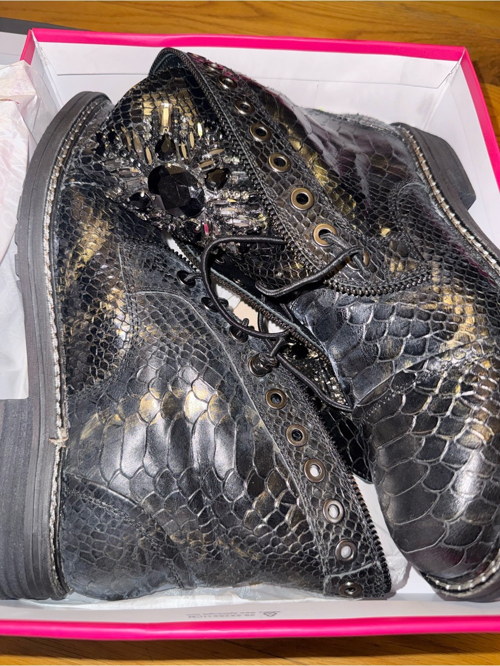 Vince Camuto Black Snake-Embossed Combat Boots with Gold Accents